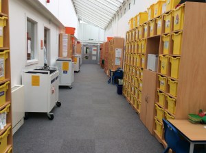 storage units with plastic boxes in the corridors